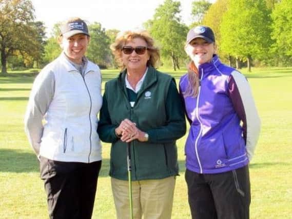 Fulford semi-finalists Emma Brown, left, and Megan Garland, right, with Yorkshire captain Fran Dickson.