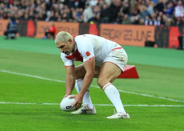 England's Ryan Hall scores his side's third try.