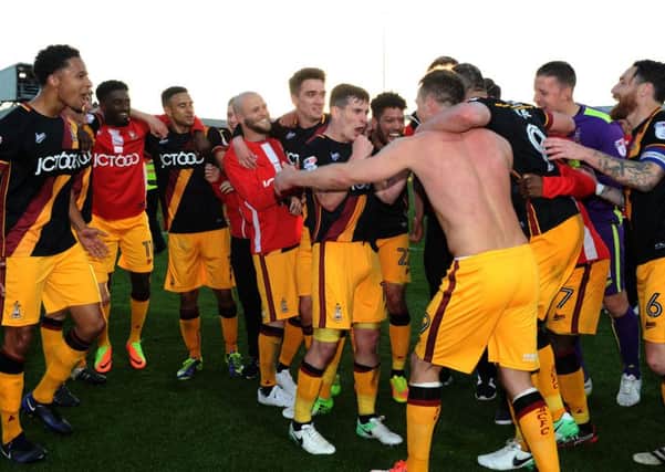 Bradford City players celebrate reaching the League One play-off final after a goalless draw at Fleetwood Town in their semi-final second leg put them through 1-0 on aggregate (Picture: Jonathan Gawthorpe).