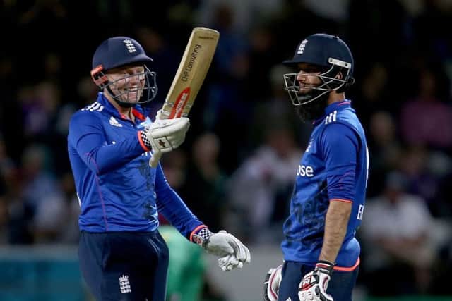 RIGHT MAN: Jonny Bairstow (left) is congratulated by Moeen Ali after his 50 during a one-day international at Headingley last year. PRESS ASSOCIATION Photo. Pictur: Richard Sellers/PA.
