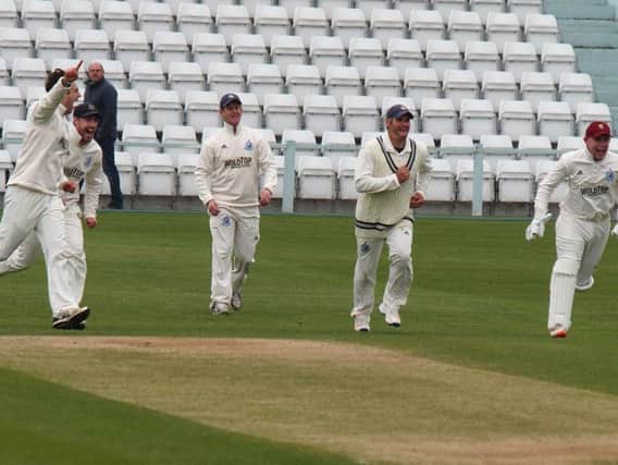 Scarborough celebrate a wicket during their victory at North Marine Road