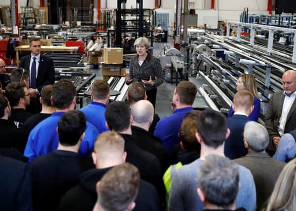 Theresa May on the campaign trail in Leeds.