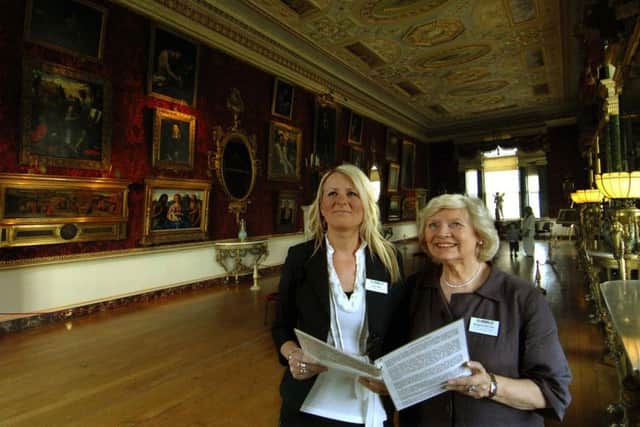 Margaret Burrows (right) with assistant curator Ruby Wills in the gallery at at Harewood House in 2009