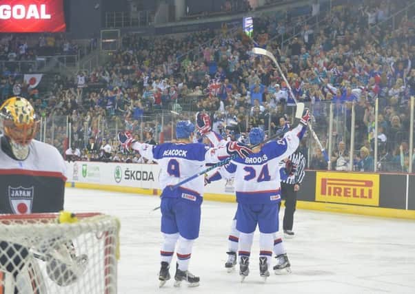 GB's players celebrate during their final day, gold-medal-winning triumph over Japan in Belfast. Picture: Dean Woolley.