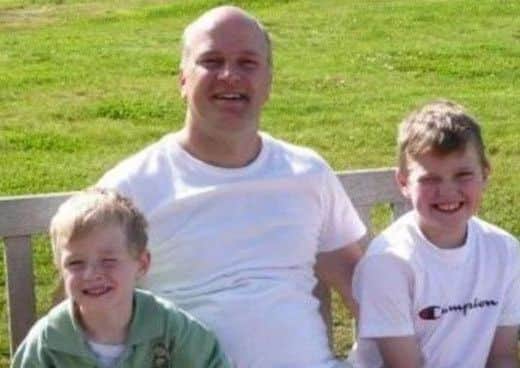 Picture shows Darren Sykes with his sons Paul, left, and Jack.
