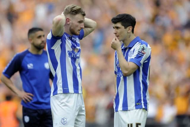 DISMAY: Sheffield Wednesday's Fernando Forestieri and Tom Lees after last season's play-off final defeat to Hull City. Picture: Steve Ellis.