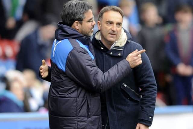 Owls head coach Carlos Carvalhal with Town's David Wagner at the final whistle