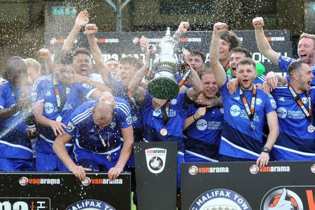 FC Halifax Town's players celebrate promotion after winning 2-1 after extra time. Picture: Tony Johnson.