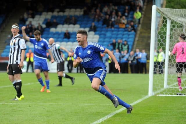 YOU BEAUTY! FC Halifax Town's Scott Garner celebrates after scoring the winner in extra time. Picture: Tony Johnson.