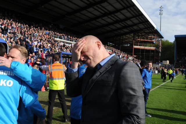 PHEW! FC Halifax Town manager Billy Heath shows his relief at the final whistle after seeing his team promoted Picture: Tony Johnson.