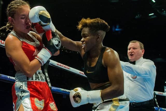 Nicola Adams lands a crunching punch on Maryan Salazar  at First Direct Arena, Leeds. (Picture: James Hardisty)