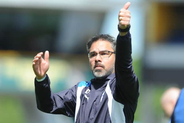 GOOD DAY: Huddersfield Town boss David Wagner gives thumbs up to the fans at the end of the match. Picture: Tony Johnson.