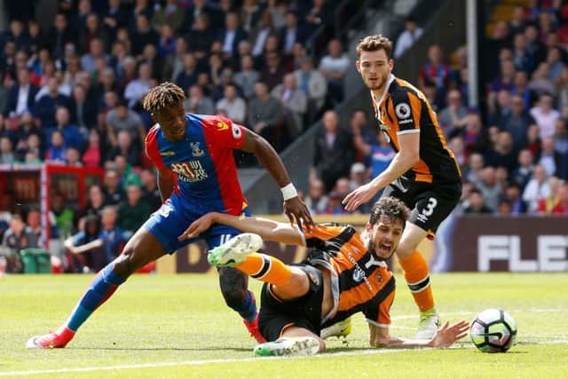 Down and out: Eldin Jakupovic applauds the travelling Hull City fans who could only watch in frustration as their team were relegated. (Picture: PA)