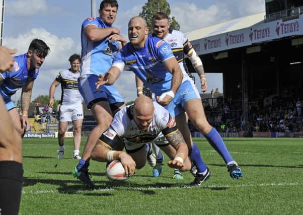 Keith Galloway goes over for as Leeds try.