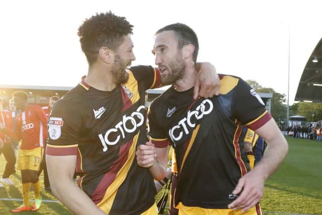 Bradford's Nathaniel Knight-Percival (left) and Rory McArdle celebrate after the final whistle during the Sky Bet League One playoff semi-final, second leg