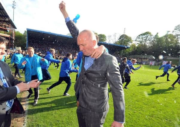 FC Halifax Town manager Billy Heath celebrates their weekend play-off final victory over Chorley.
