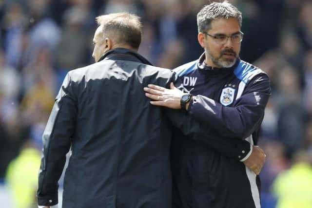 Huddersfield Town boss David Wagner with Sheffield Wednesday head coach Carlos Carvalhal, left.