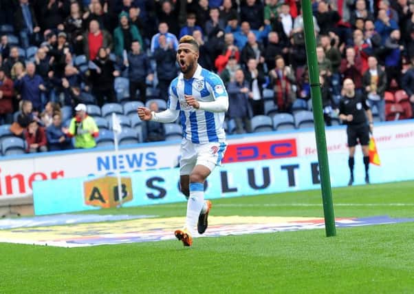 Impact: Huddersfield Towns Elias Kachunga celebrates scoring against Preston recently, one of 13 goals he has scored in Towns unlikely promotion bid. (Picture: Jonathan Gawthorpe)