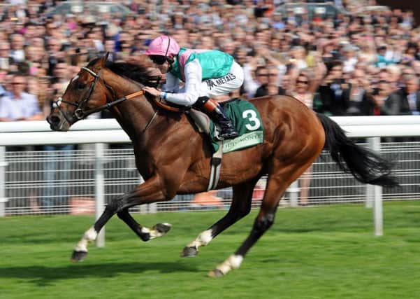 Frankel ridden by Tom Queally wins the Juddmonte International Stakes during day one of the 2012 Ebor Festival at York Racecourse. (Picture: Anna Gowthorpe/PA Wire)