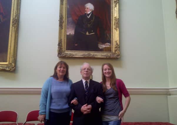 Four generations of Doncaster's Cooke dynasty: Sir David Cooke, with his daughter Louise and granddaughter Rachel beneath a portrait of Sir Bryan Cooke in Doncaster's Mansion House. Sir Bryan was mayor of Doncaster in the 1800s and his body is laid to rest  in the Cooke crypt in All Saints Church, Arksey.