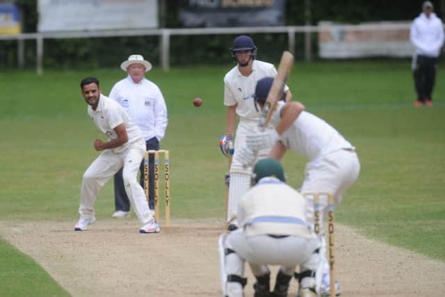 Muhammed Rameez bowling for Hanging Heaton