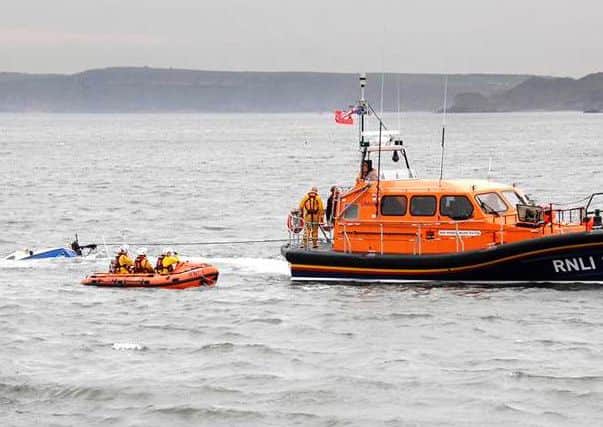 The RNLI tows in the submerged Blind Panic