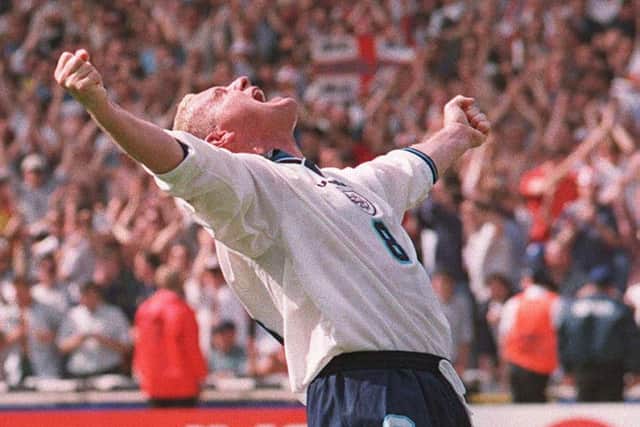 Paul Gascoigne celebrates after scoring THAT goal for England at Wembley against a Scotland side containing Stuart McCall during Euro 96. Picture: Neil Munns/PA.