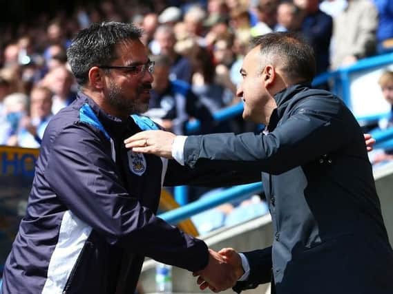 Huddersfield Town manager David Wagner, left, and Sheffield Wednesday's Carlos Carvalhal, right.