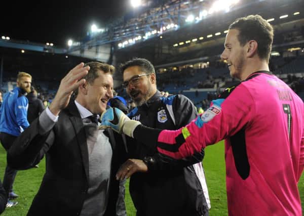Terriers chairman Dean Hoyle celebrates with manager David Wagner and keeper Danny Ward getting to Wembley after the penalty shootout. (Picture: Tony Johnson)