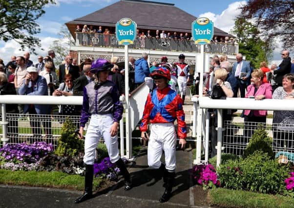 Jockeys wore black armbands at York racecourse on Thursday following the death of trainer Alan Swinbank the previous day. Picture: Mike Egerton/PA.