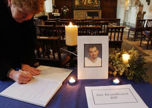 A book of remembrance for Ian Broadhurst is signed at Leeds Parish Church, now Leeds Minster, in 2003.