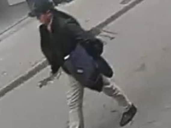 A CCTV image of one of the men police are seeking.