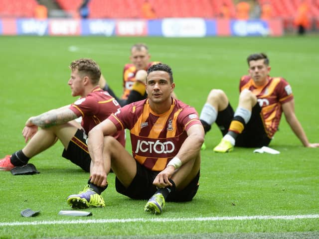 The dejected Bradford players at full-time