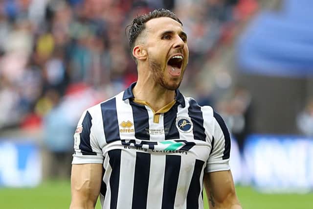 Millwall's Lee Gregory celebrates on the pitch at Wembley on Saturday, but only after consoling Bradford City's players. Picture: Mike Egerton/PA