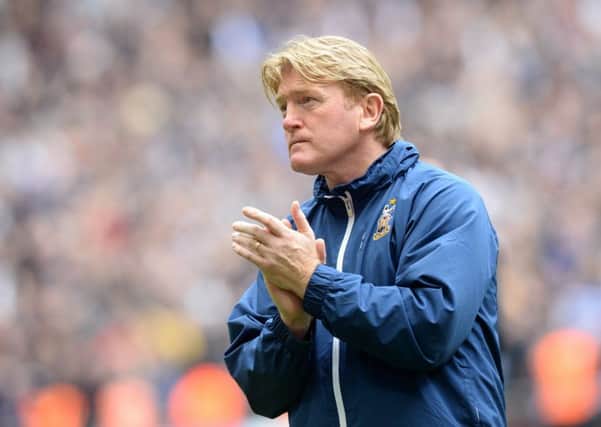 Bradford City manager Stuart McCall applauds Millwall as they collect their play-off winners trophy.  Picture: Bruce Rollinson