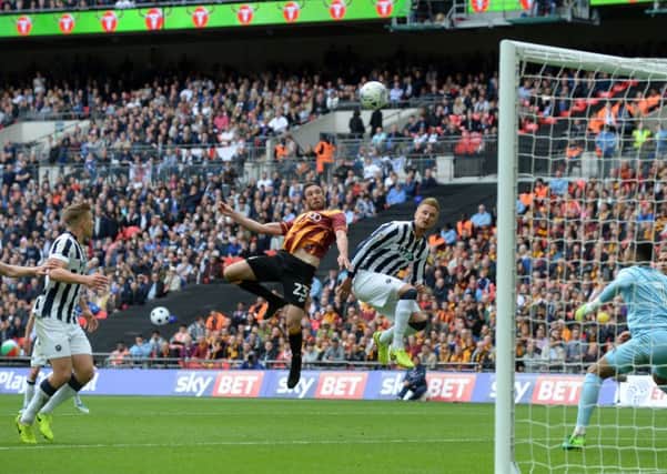 Rory McArdle's header goes over the bar at Wembley on Saturday.  Picture Bruce Rollinson