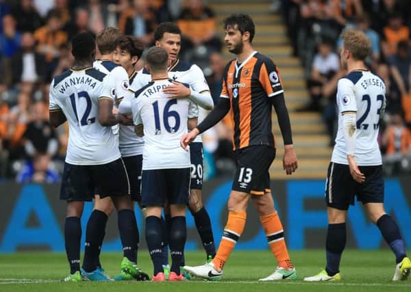 Tottenham Hotspur's Dele Alli (centre left) celebrates scoring his side's third goal of the game at Hull City.