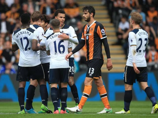 Tottenham Hotspur's Dele Alli (centre left) celebrates scoring his side's third goal of the game at Hull City.