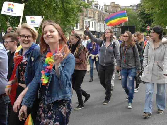 Crowds celebrated diversity in Harrogate by joining in with the march. Picture: Adrian Murray