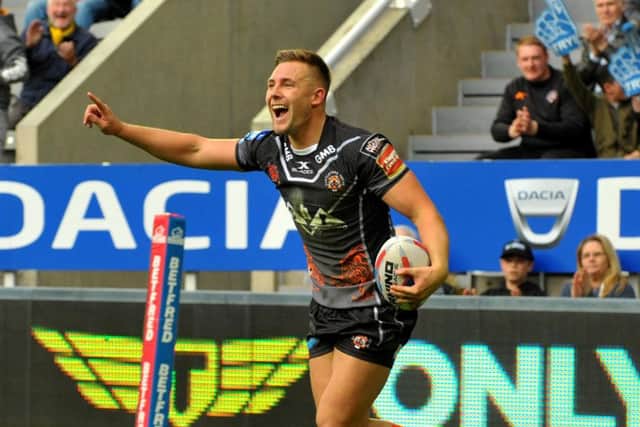 Greg Eden celebrates scoring one of his tries against Leeds Rhinos at Newcastle on Sunday evening.