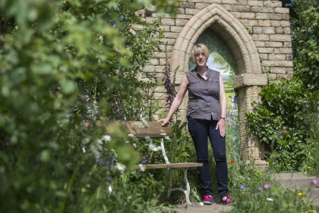Garden designer Tracy Foster in her Welcome to Yorkshire Garden during the press preview of the RHS Chelsea Flower Show