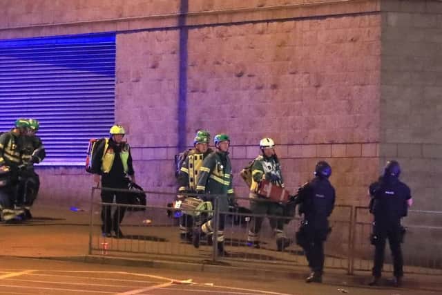 Emergency services at Manchester Arena after an explosion at the venue during an Ariana Grande concert. Picture: Peter Byrne/PA Wire