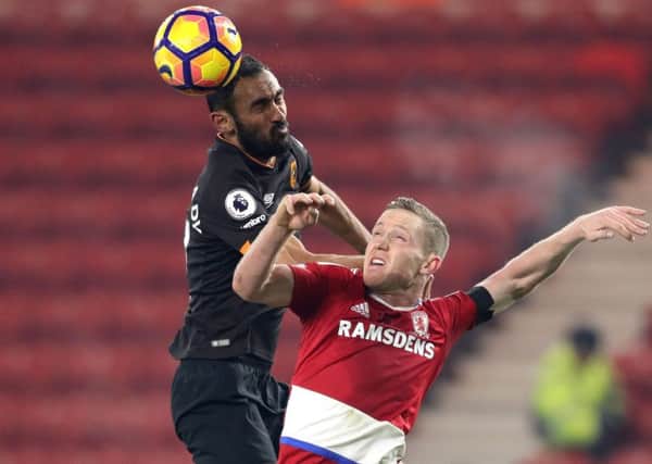 Hull City's Ahmed Elmohamady (left) and Middlesbrough's Adam Forshaw battle for the ball at the Riverside Stadium in December last year. Picture: Owen Humphreys/PA