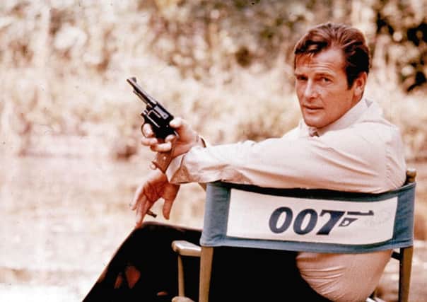 Roger Moore, playing the title role of secret service agent 007, James Bond, is shown on location in England in 1972.