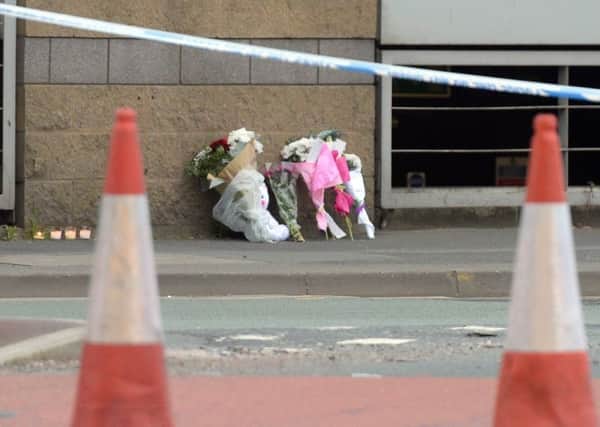 Flowers left close to Manchester Arena. PIC: PA