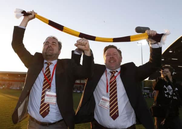 Bradford City co-owners Edin Rahic, left, and Stefan Rupp celebrate after reaching Wembley (Picture: PA).