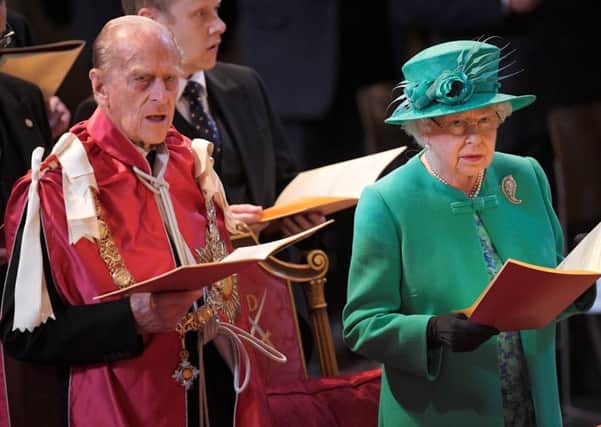 The Queen and the Duke of Edinburgh during a service at St Paul's Cathedral in London to mark the Centenary of the Order of the British Empire.