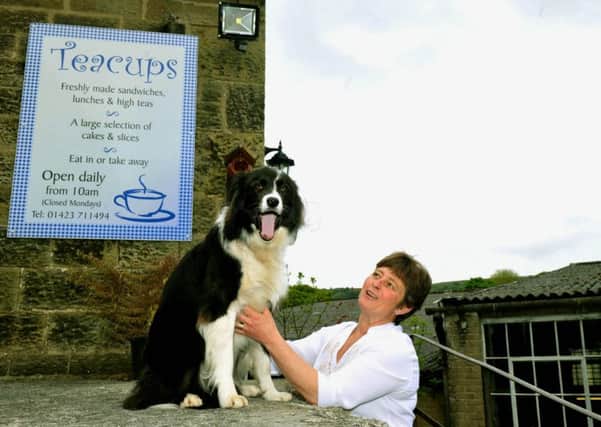 Sam Jackson with her dog Bow at the Teacups cafe at Pateley Bridge Auction Mart. Pictures by Gary Longbottom.