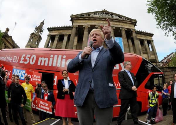 Foreign Secretary Boris Johnson with a Brexit battlebus which made a link between EU spending and the NHS.