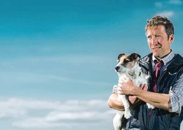 Julian Norton, pictured with his three year old Jack Russell, called Emmy.